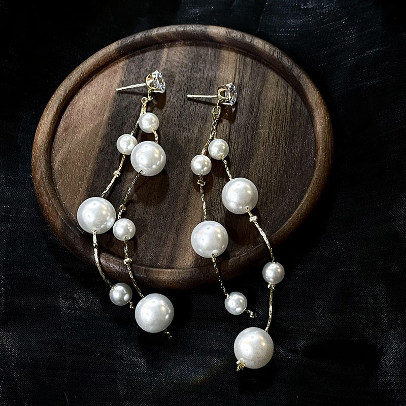 科技與時(shí)尚完美融合，最新長(zhǎng)款珍珠耳飾款式亮相！